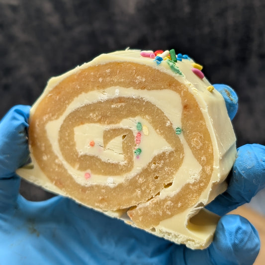Blondie Log with birthday sprinkles and white chocolate filling and topping