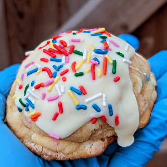 white chocolate vanilla sponge stuffed cookie with sprinkles