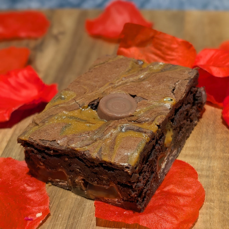 Rolo Brownie topped with caramel sauce